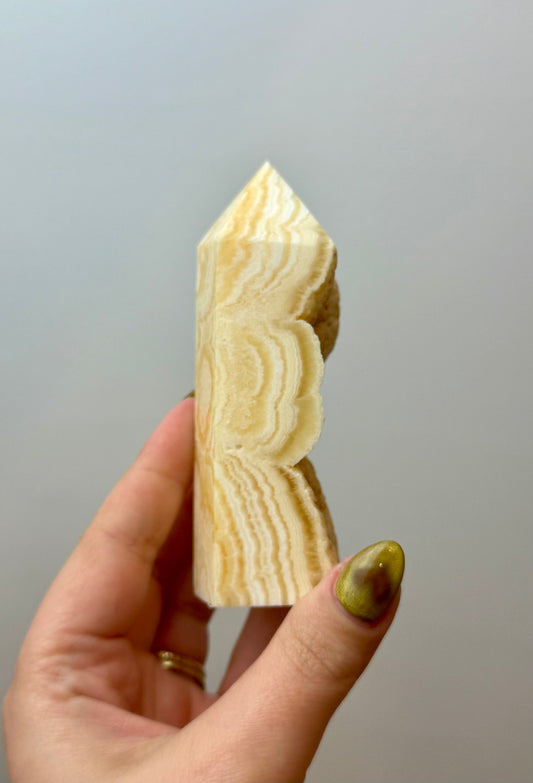 Orange calcite half raw tower