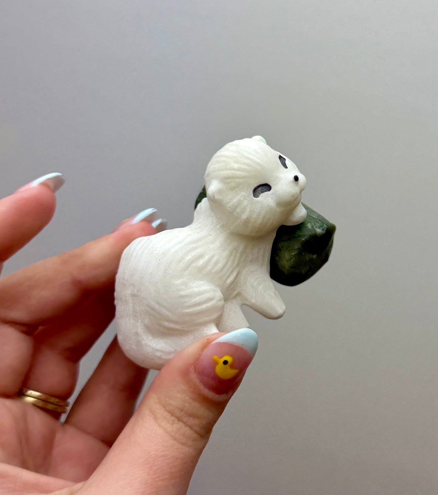 White jade otter carvings