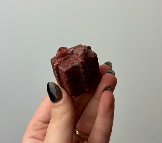 Brecciated jasper present carving