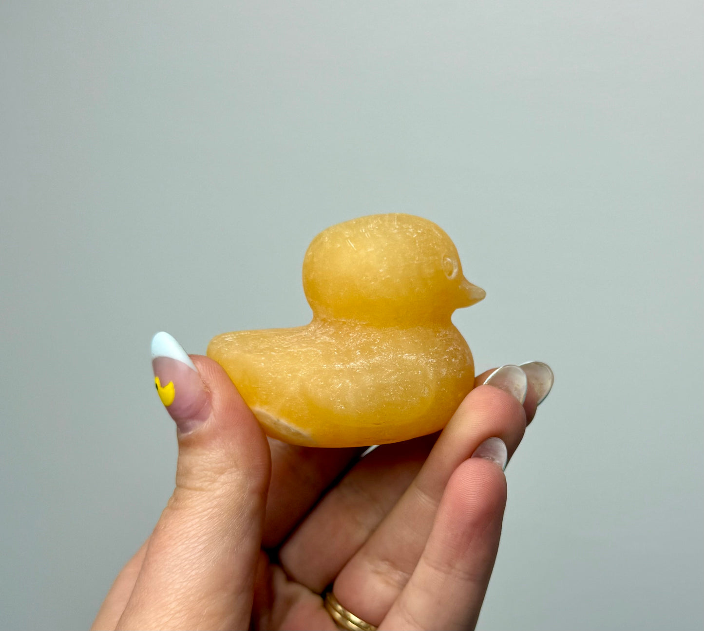 Orange calcite duck carvings