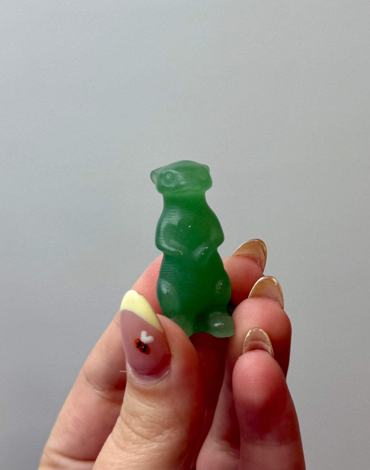 Green aventurine meerkat carving