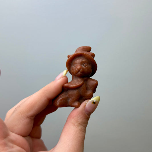 Man made material goldstone witch cat carving