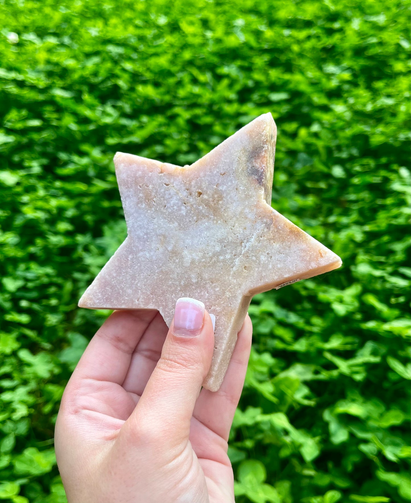 Pink amethyst star carving 58