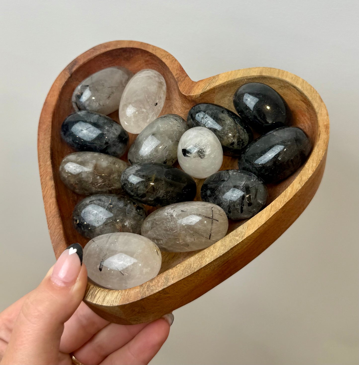 Black tourmaline in quartz tumbles