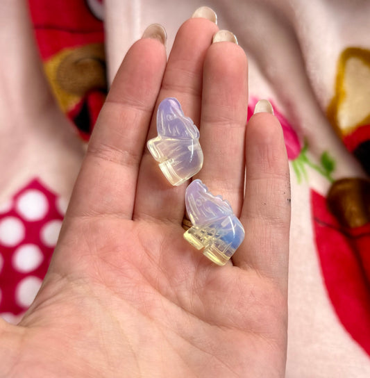 Man made material Opalite elephant carvings