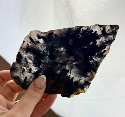 Black tourmaline in quartz slab