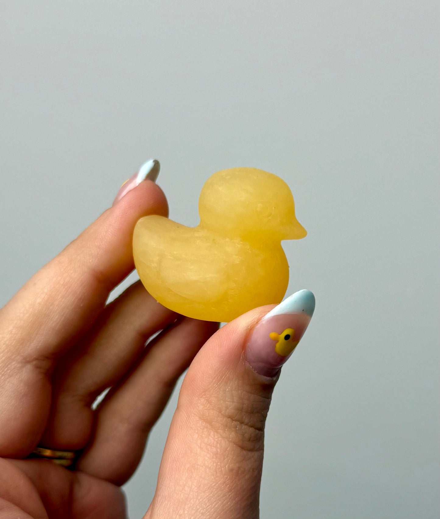 Orange calcite duck carvings