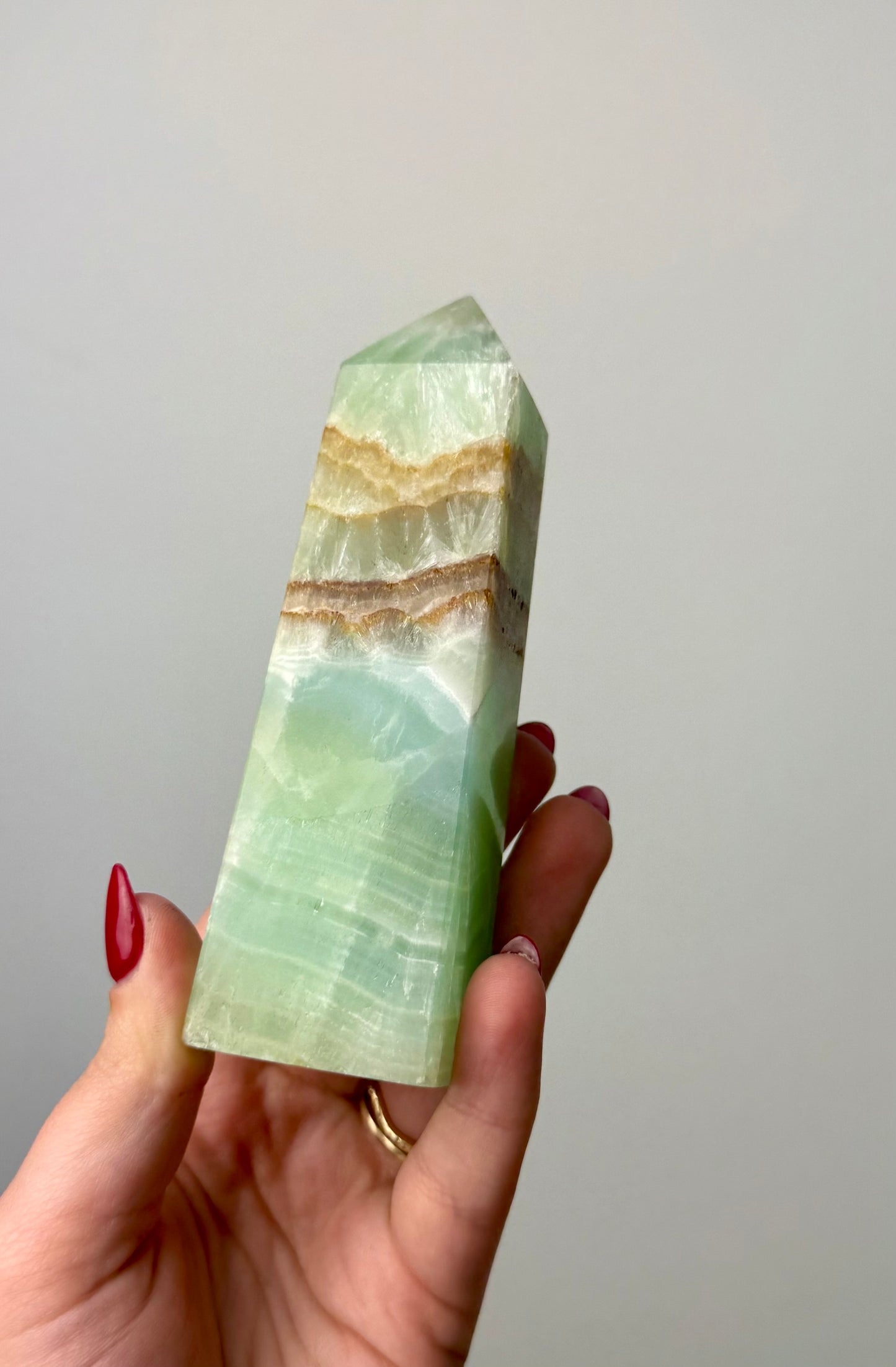 Pistachio green calcite tower