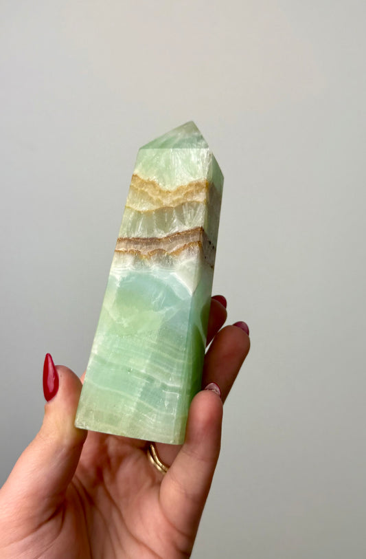 Pistachio green calcite tower
