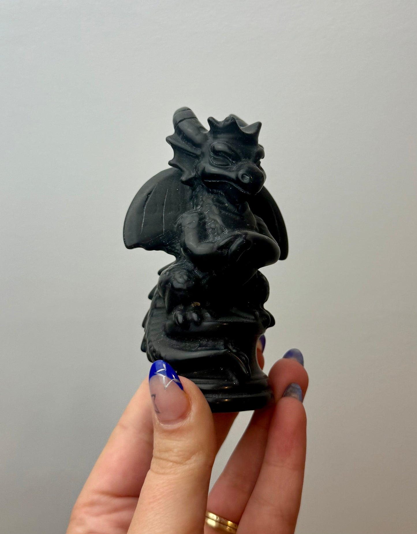 Obsidian dragon carving
