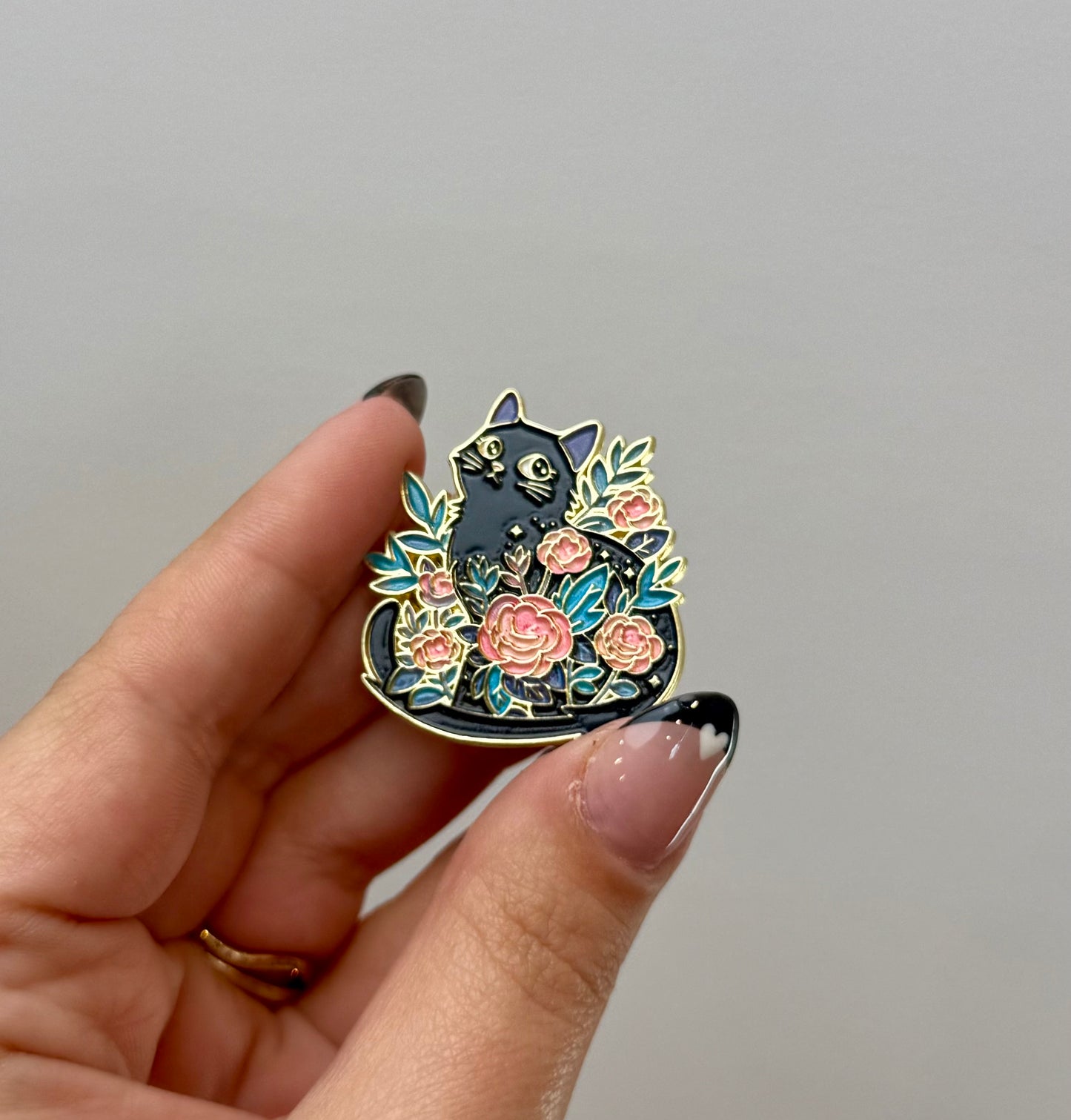 Black cat enamel pin