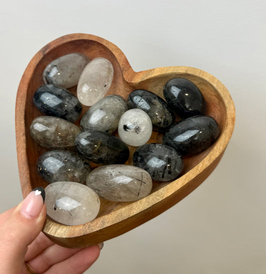 Black tourmaline in quartz tumbles