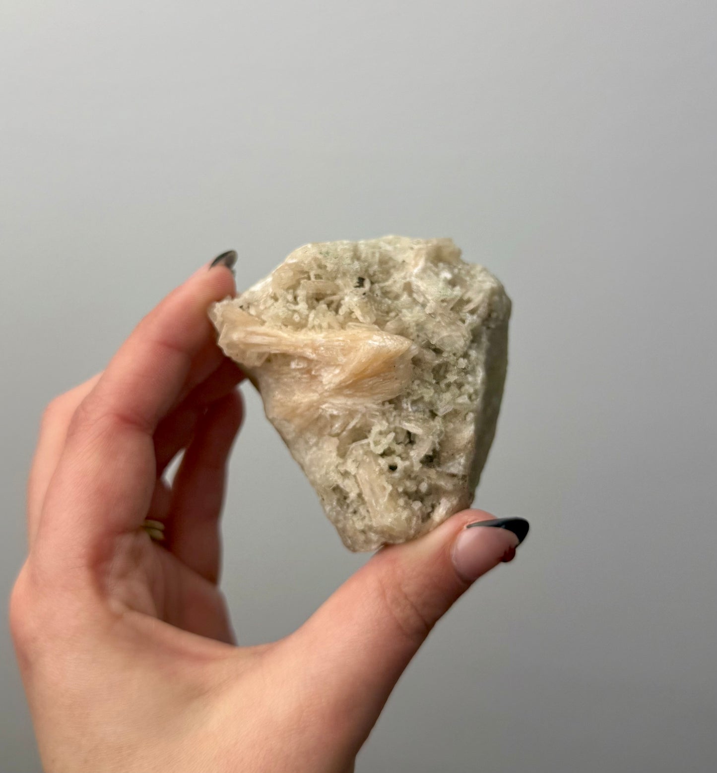 Peach stilbite specimen