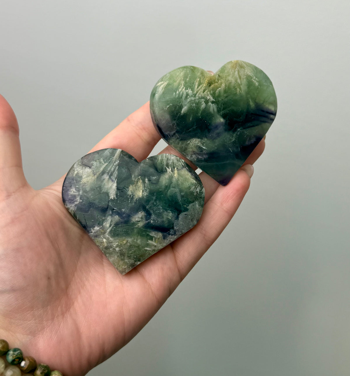 Feather fluorite heart carvings