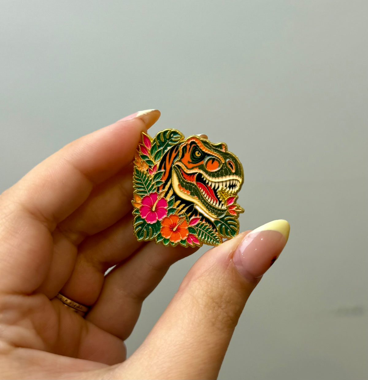 Dinosaur enamel pin