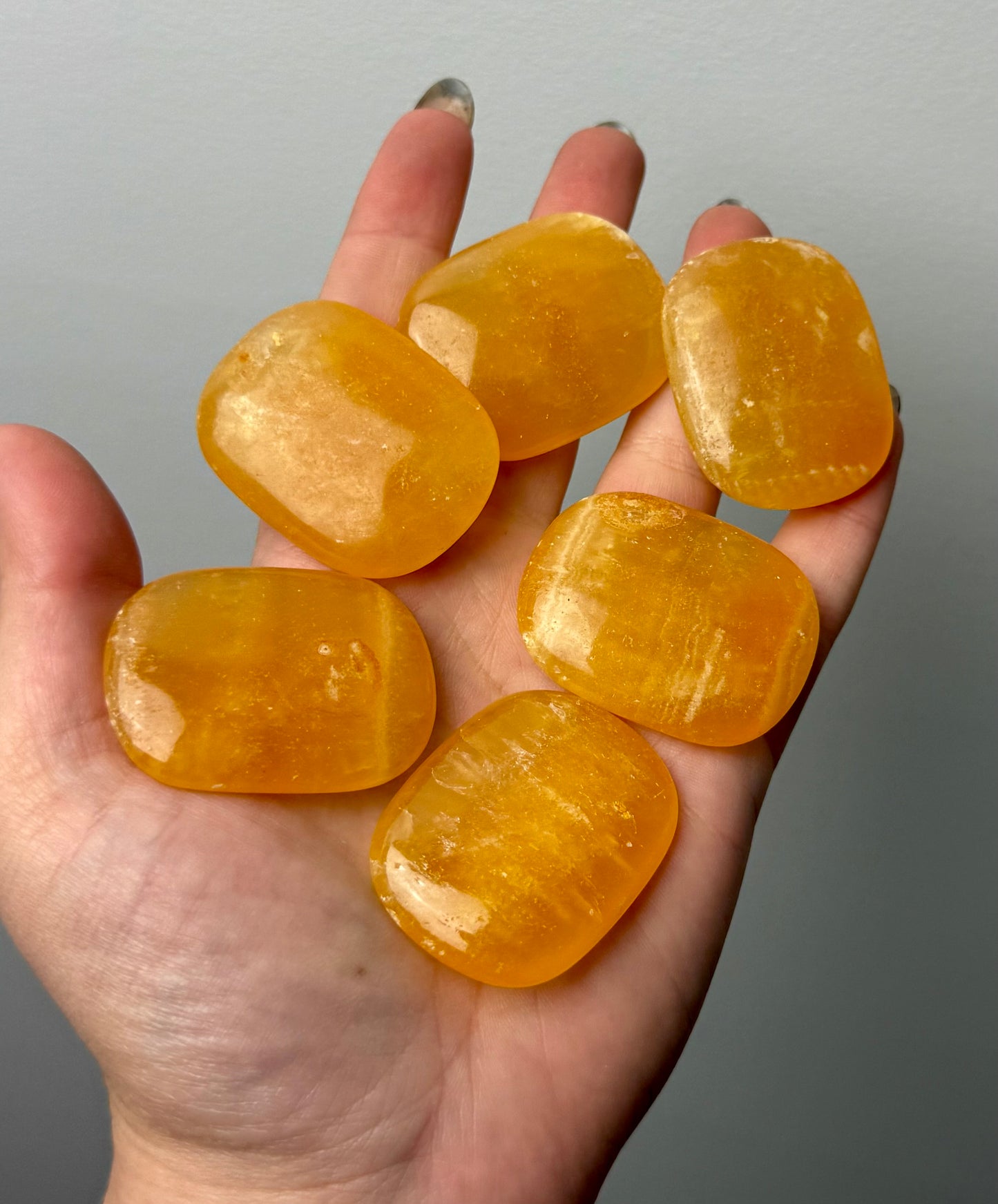 Orange calcite flat stones