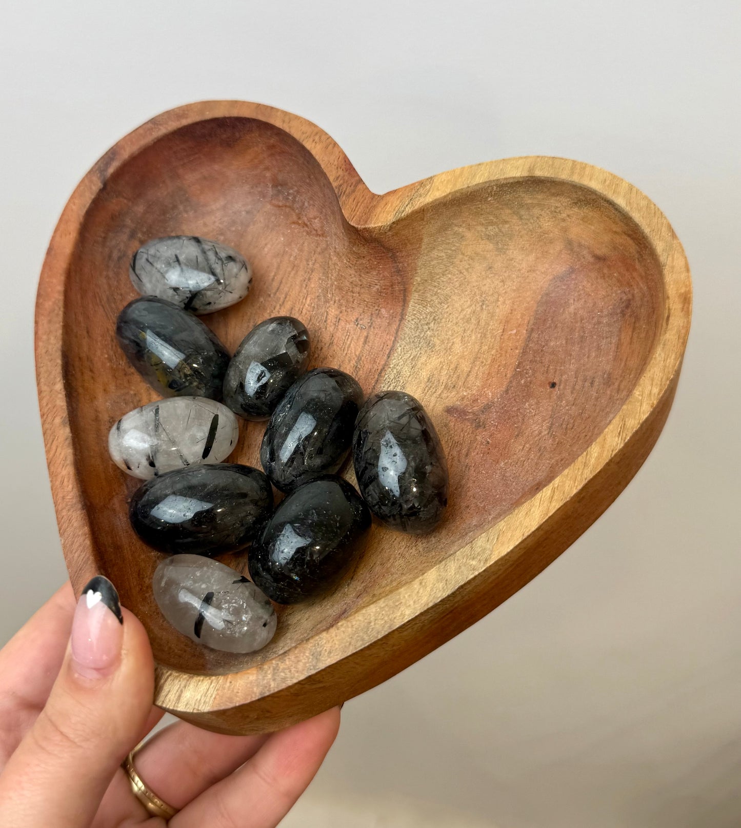 Black tourmaline in quartz tumbles
