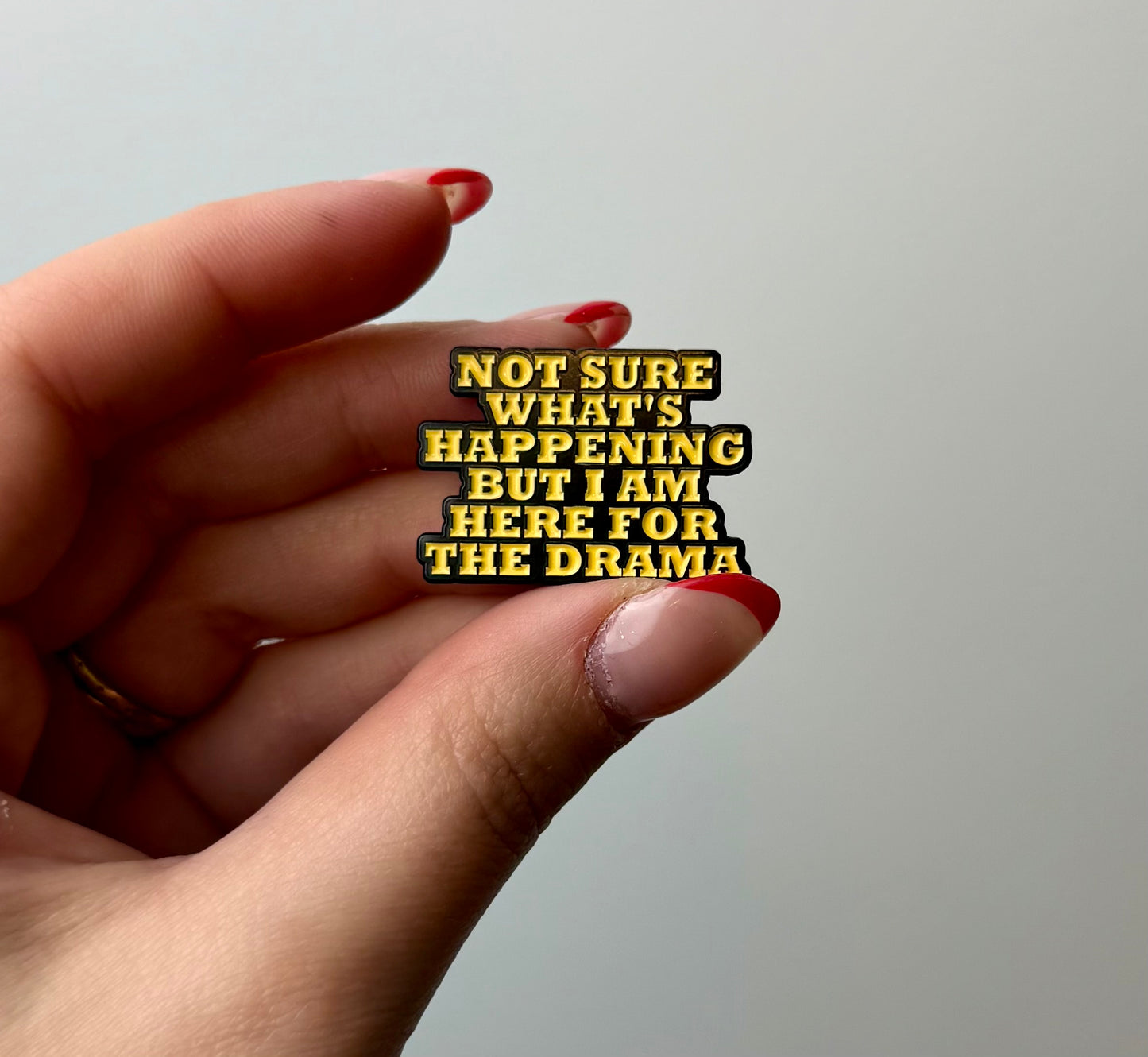 Drama enamel pin
