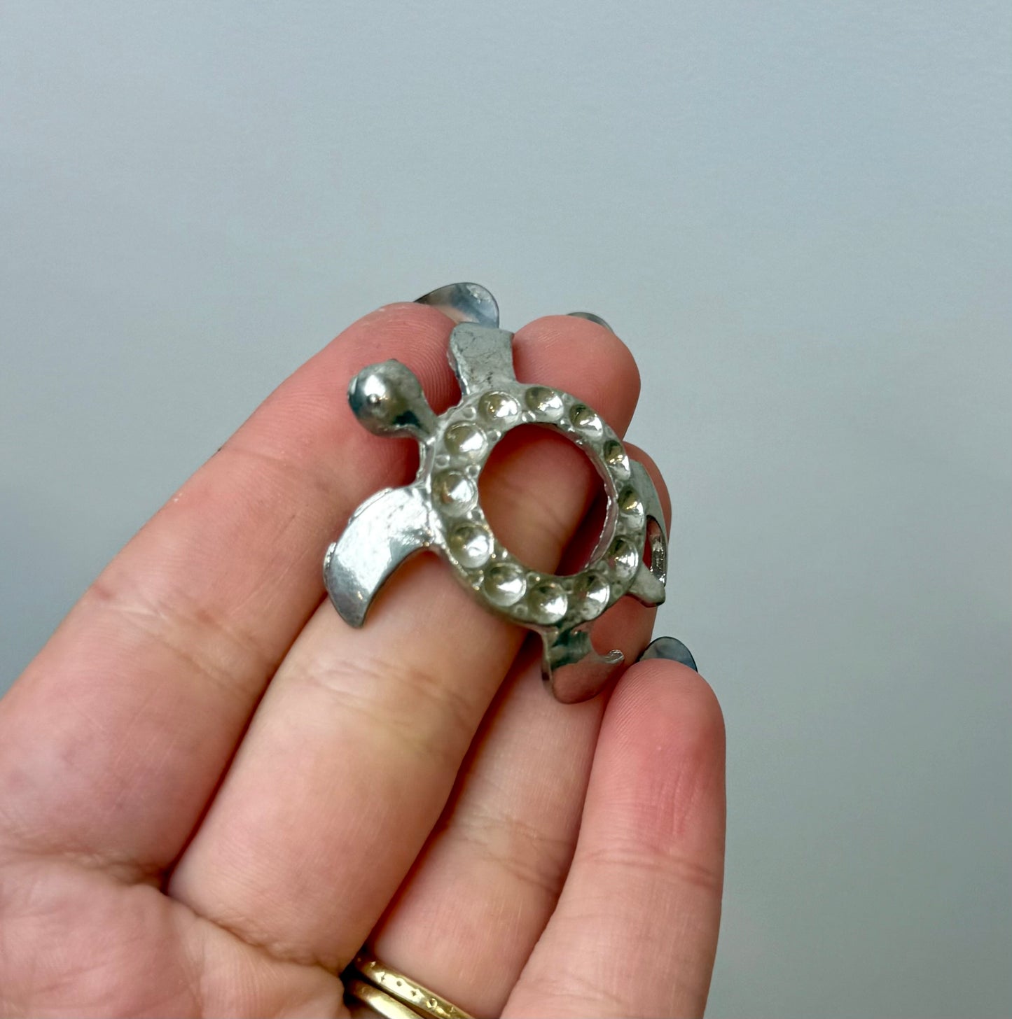 Silver turtle sphere stand