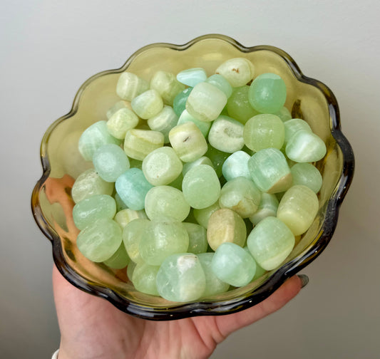 Pistachio green calcite tumbles