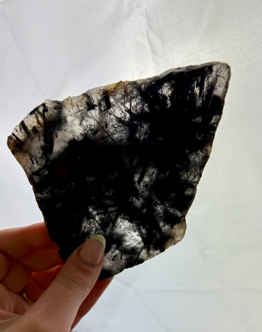 Black tourmaline in quartz slab