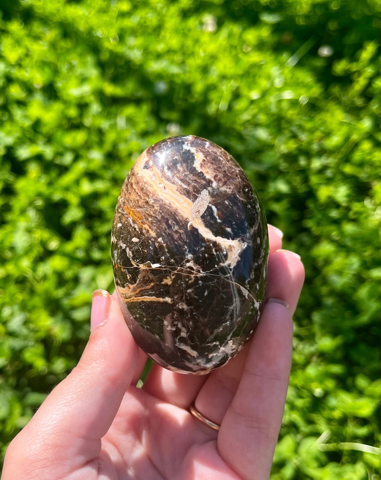 Chocolate opal palm stone