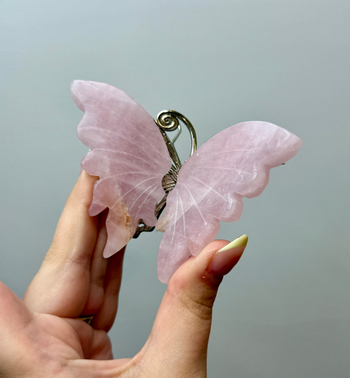 Rose quartz butterfly carving
