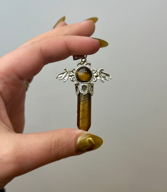 Tigers eye bat wing pendant