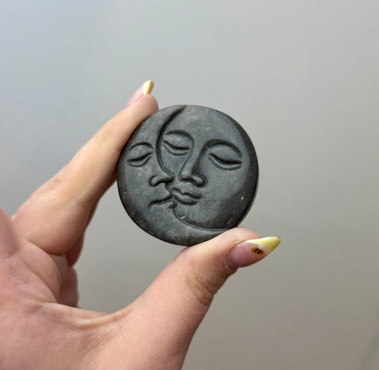 Sun and moon carving