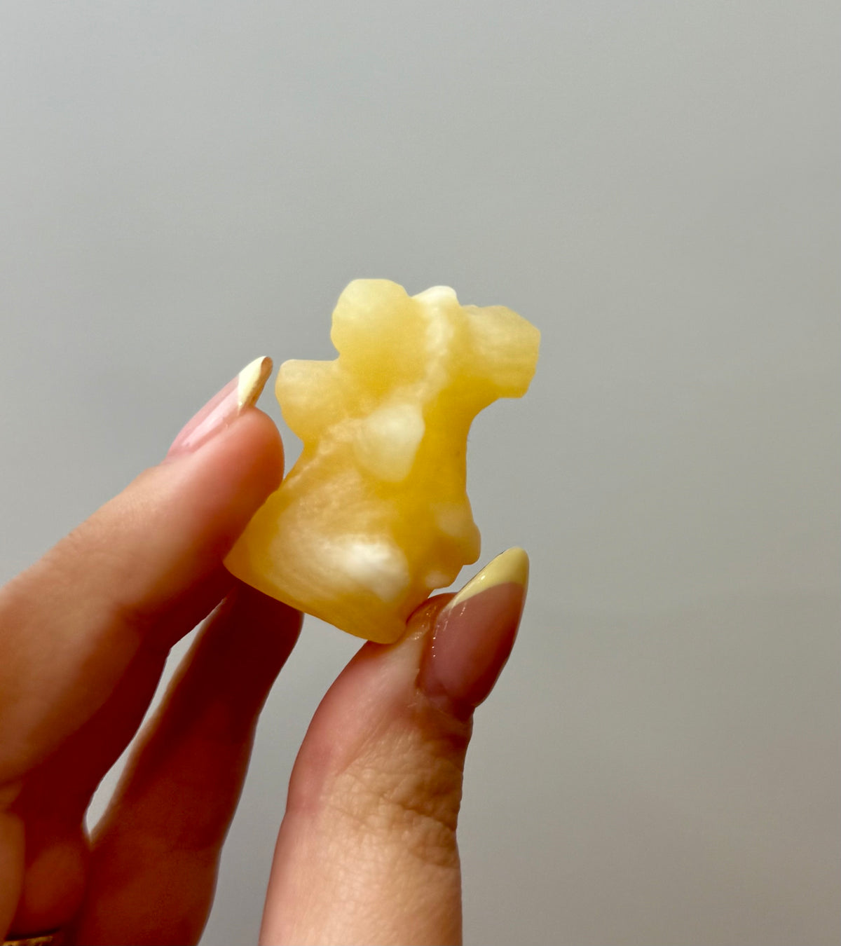 Orange calcite dragon carving