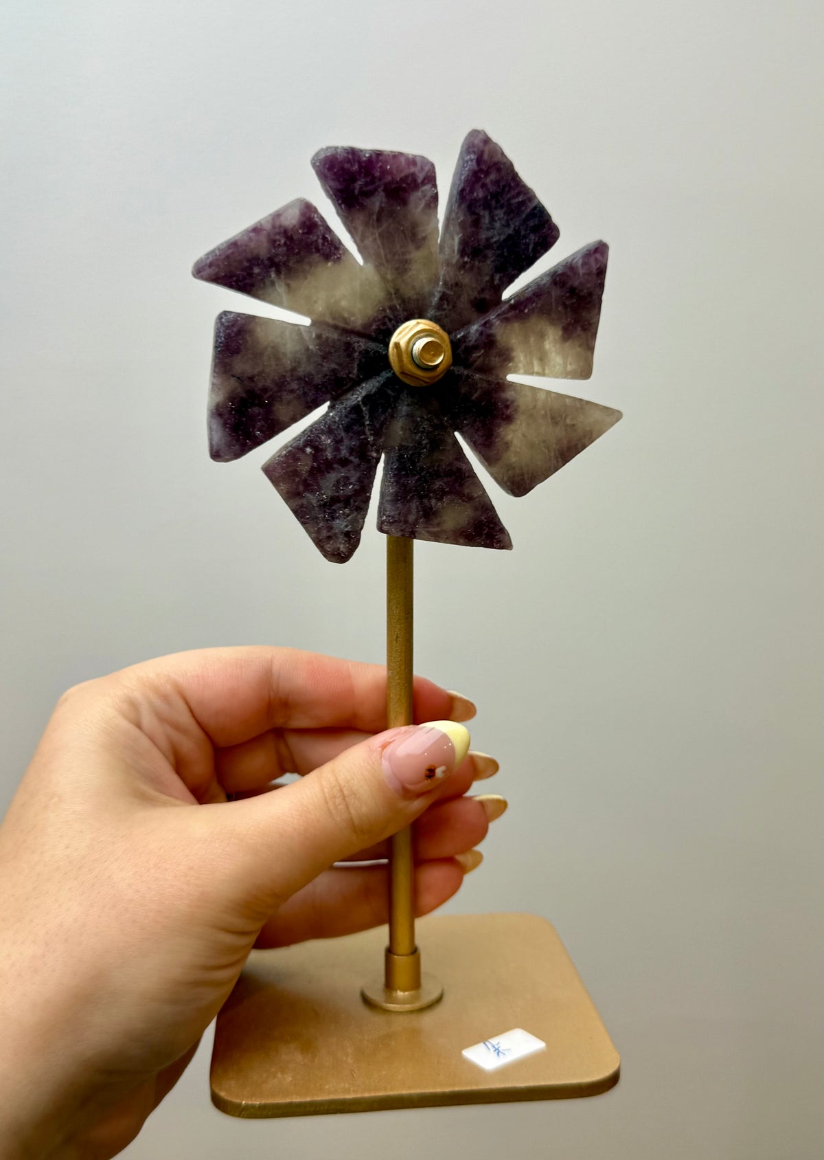 Lepidolite spinning windmill carving on a stand