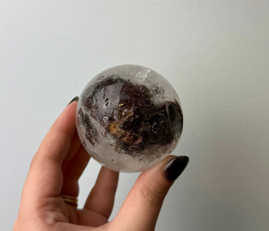Imperfect garden quartz sphere