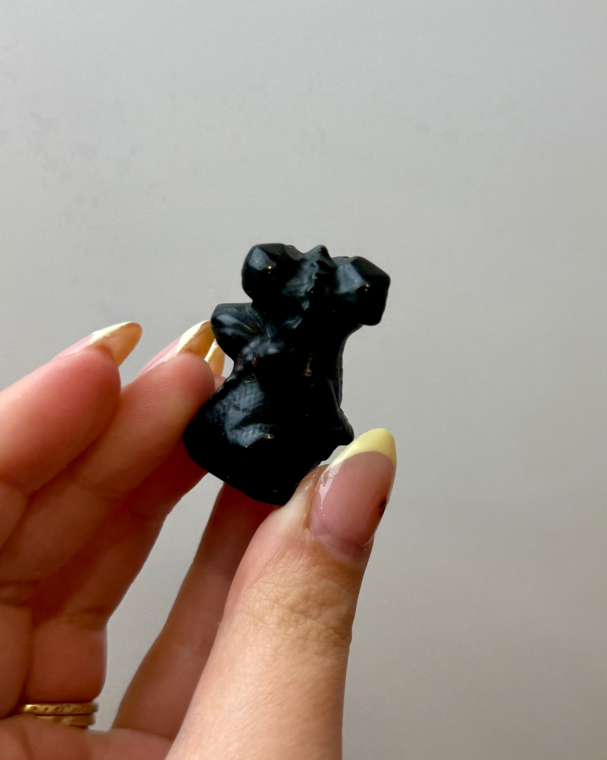 Obsidian dragon carving