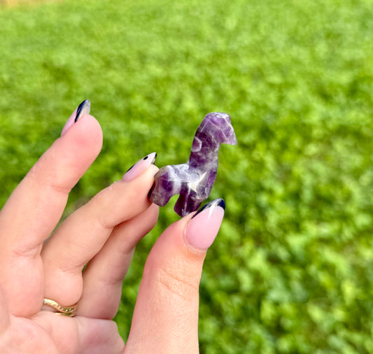 Amethyst giraffe carving