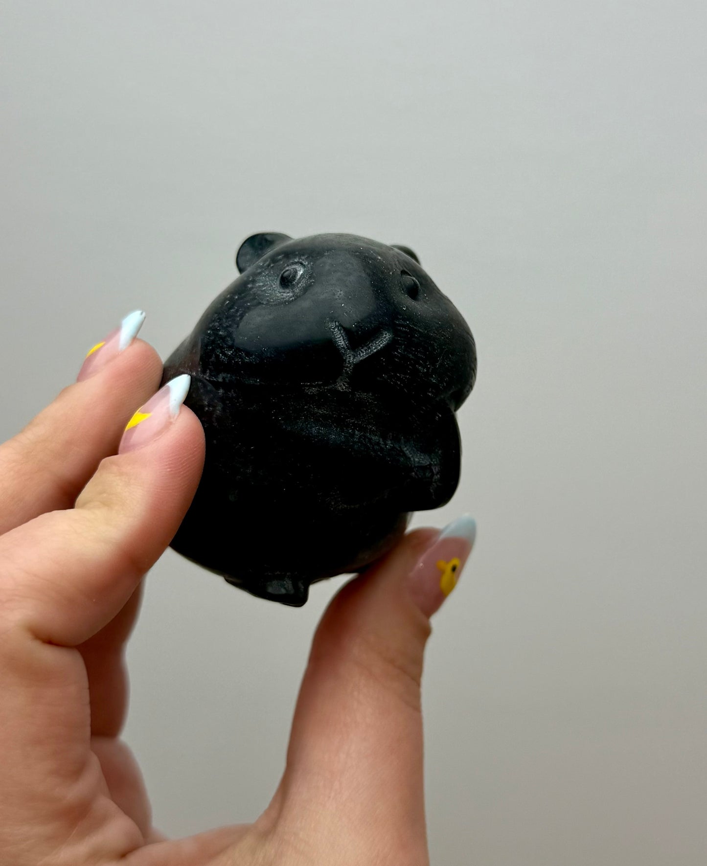 Obsidian hamster carving