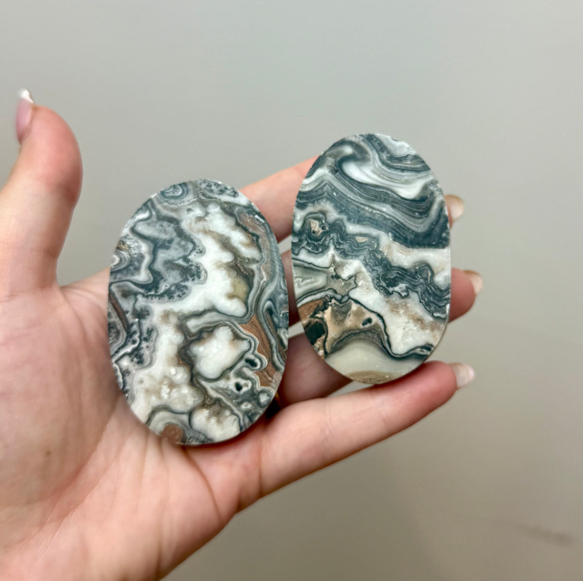 Zebra calcite palm stones