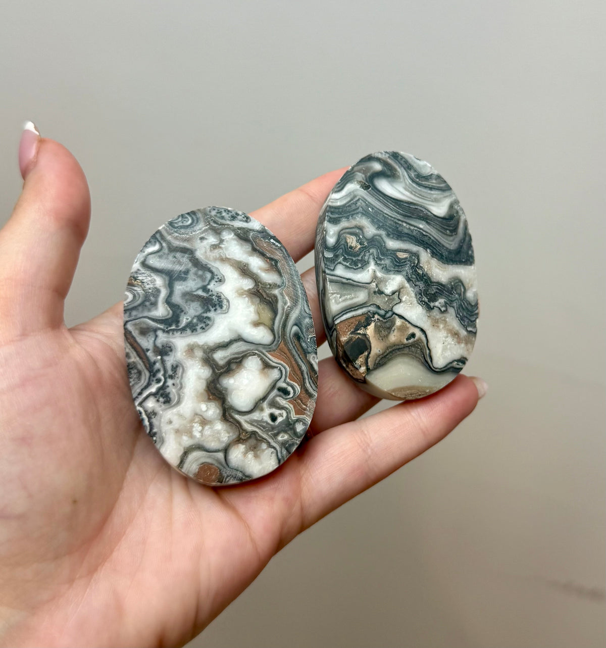 Zebra calcite palm stones