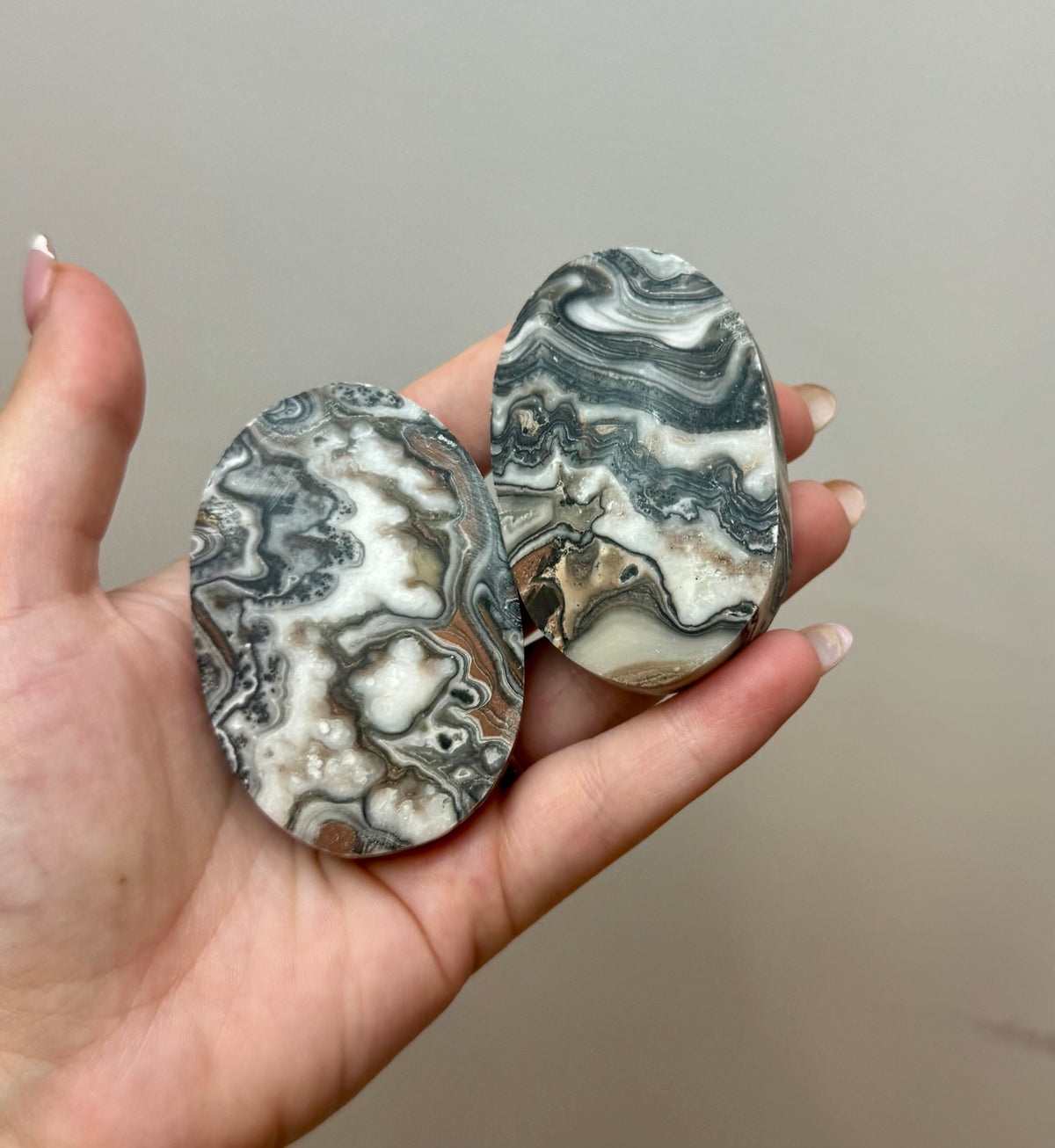 Zebra calcite palm stones