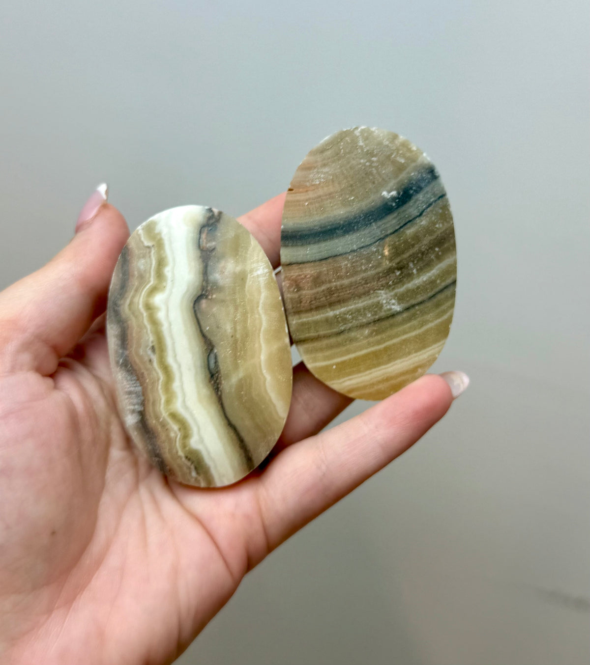 Zebra calcite palm stones