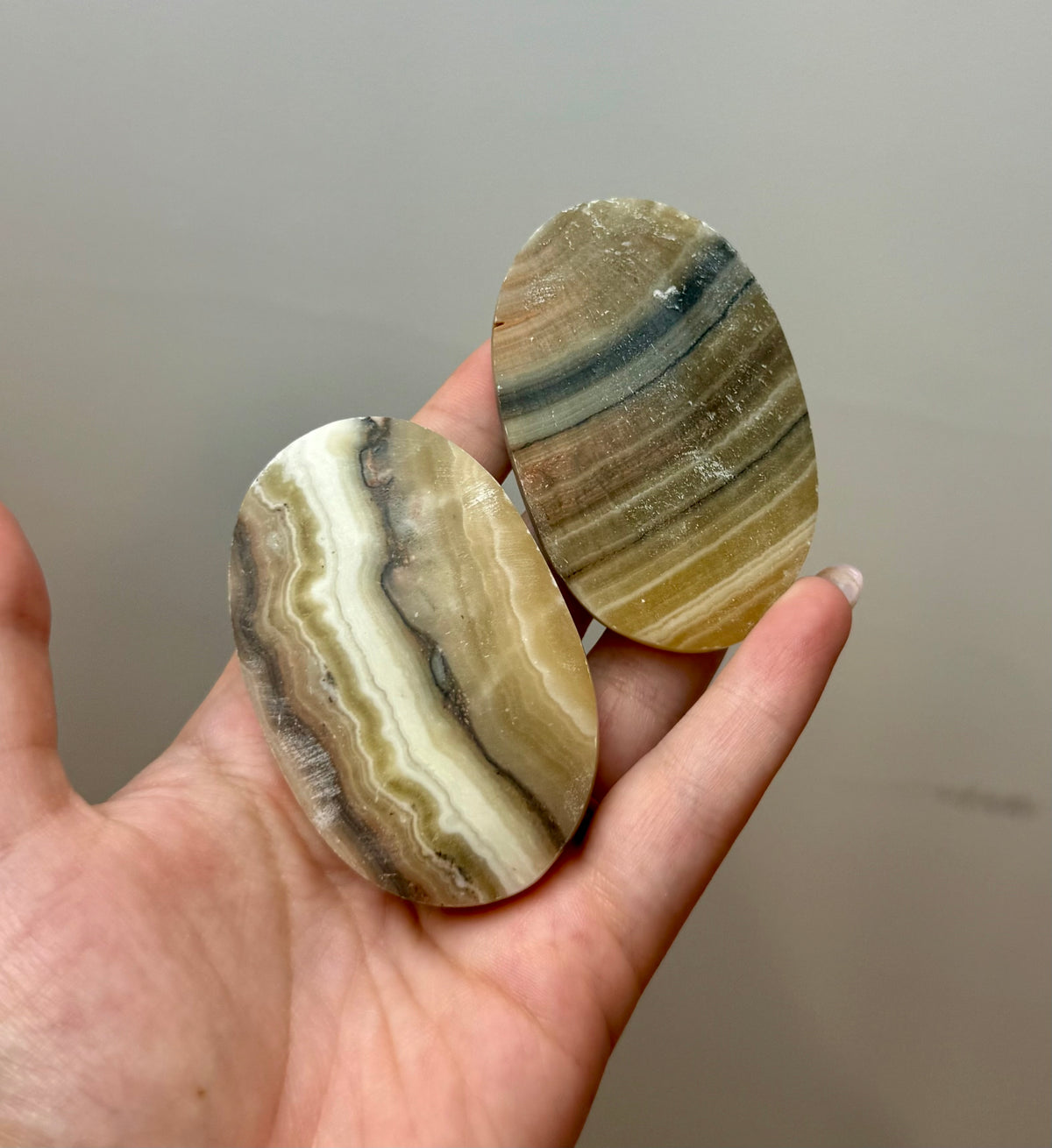 Zebra calcite palm stones