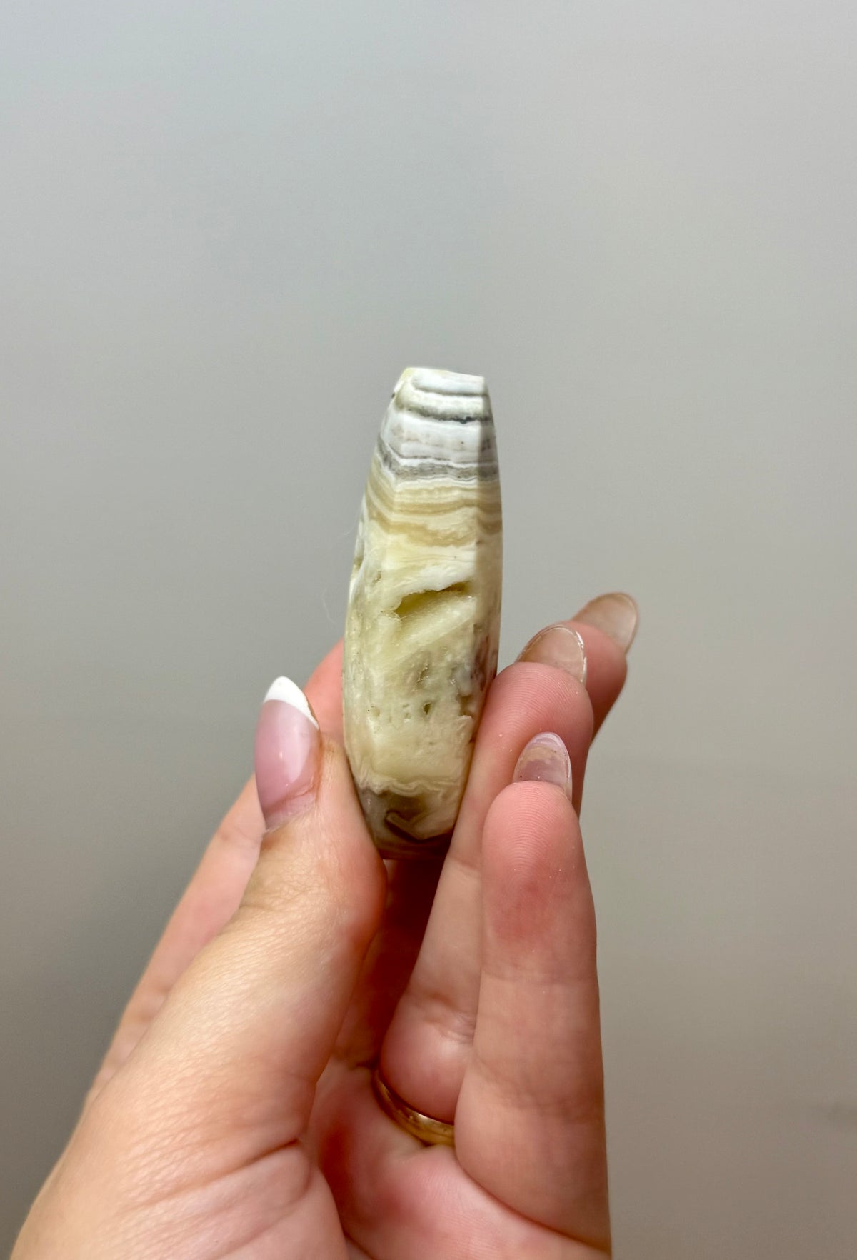 Zebra calcite palm stone