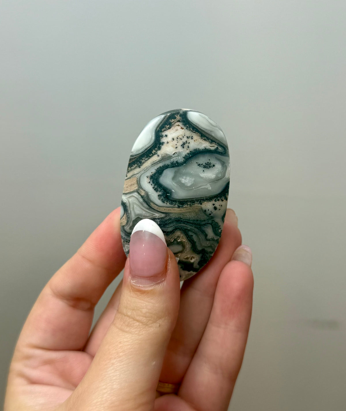Zebra calcite palm stone