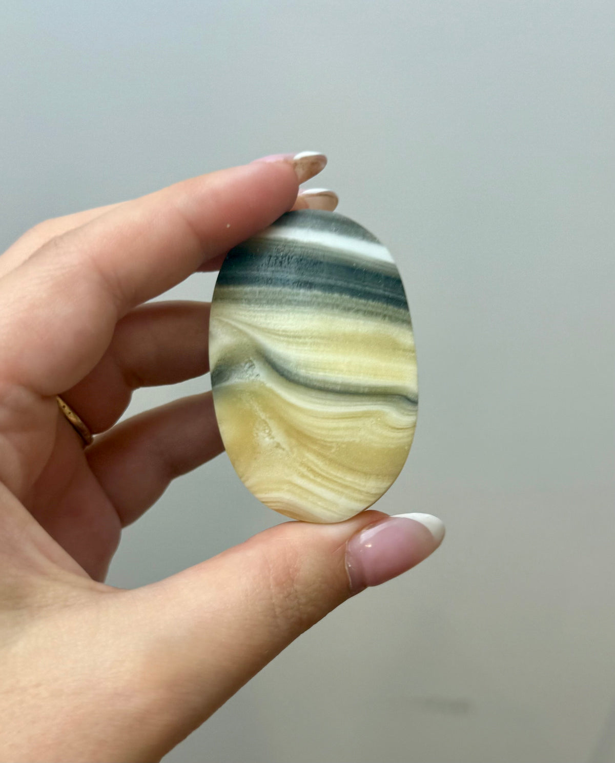 Zebra calcite palm stone