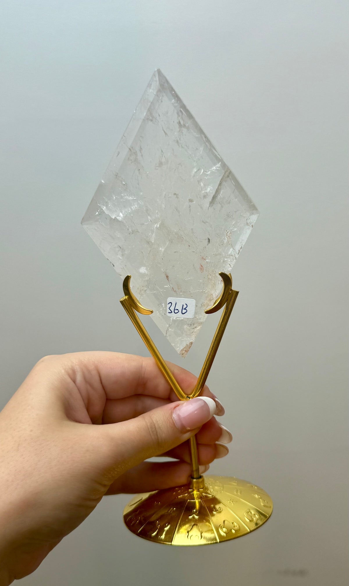 Clear quartz diamond carving on a stand 36B