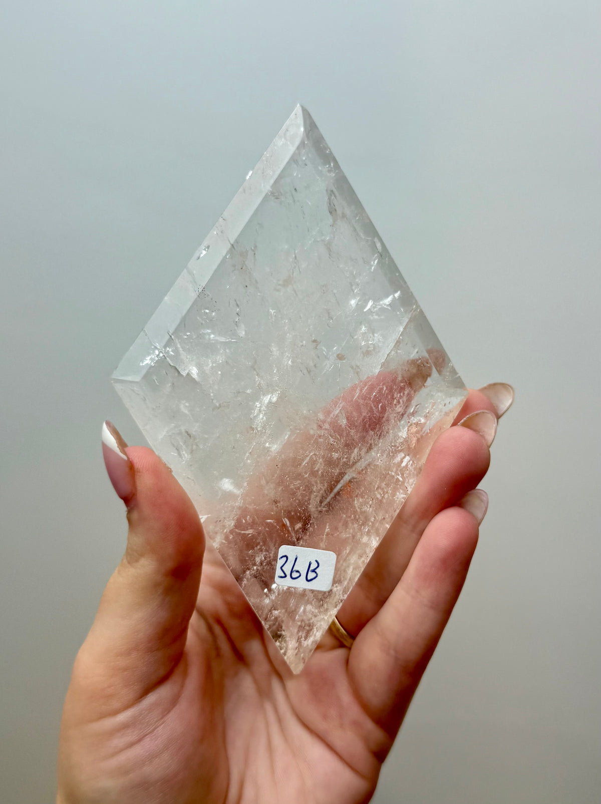 Clear quartz diamond carving on a stand 36B