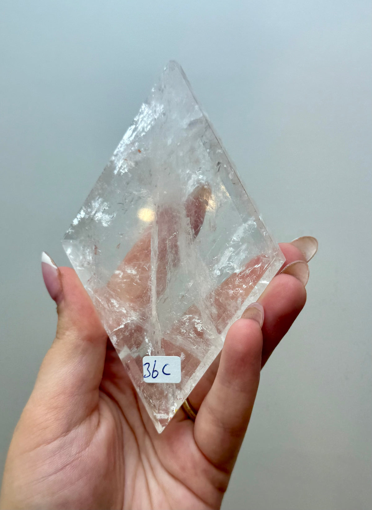Clear quartz diamond carving on a stand 36C