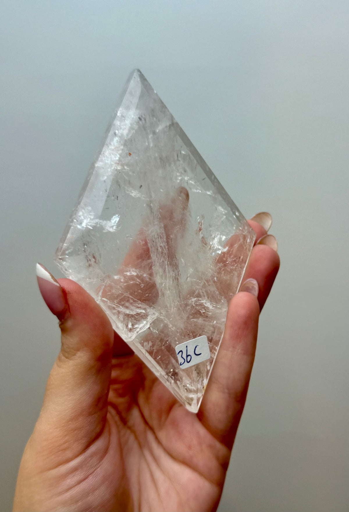 Clear quartz diamond carving on a stand 36C