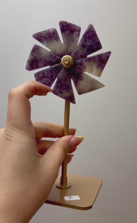 Lepidolite spinning windmill carving on a stand